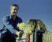 Eddie presents Julia with flowers